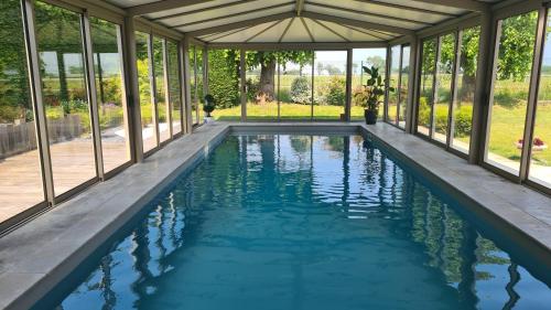 Villa 5*, mer à 3 mn, piscine intérieure à 28° : Villas proche de Bréville-les-Monts