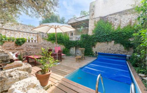 Nice Home In Montbazin With Outdoor Swimming Pool, Wifi And 2 Bedrooms : Maisons de vacances proche de Cournonterral