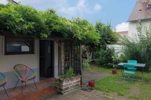 Agréable maison de ville solognote avec jardin : Maisons de vacances proche d'Olivet