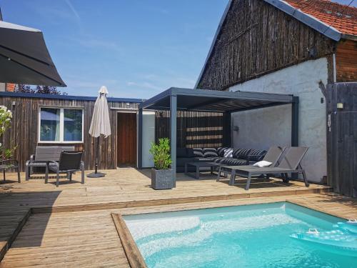 Dépendance au calme avec piscine : Maisons d'hotes proche de Les Aix-d'Angillon