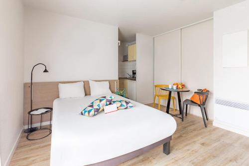 Appart'City Classic Rennes Ouest : Appart'hotels proche de La Chapelle-des-Fougeretz