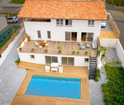Maison au calme avec piscine : Maisons de vacances proche de Rivière-Saas-et-Gourby
