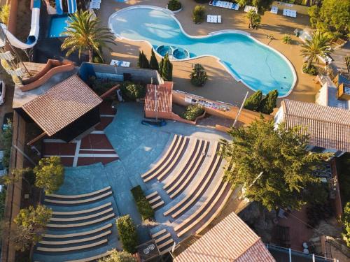 Charming relaxation area, swimming pool and games, fun for young and old : Maisons de vacances proche de Saint-Nazaire