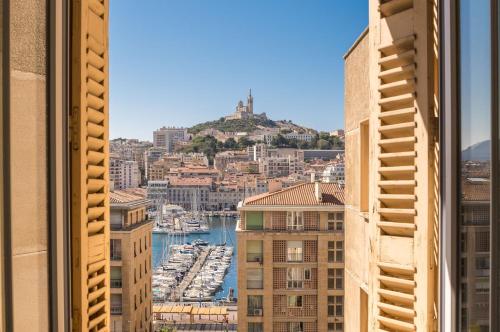 Splendide vue sur ND de la Garde et le Vieux Port : Appartements proche du 2e Arrondissement de Marseille