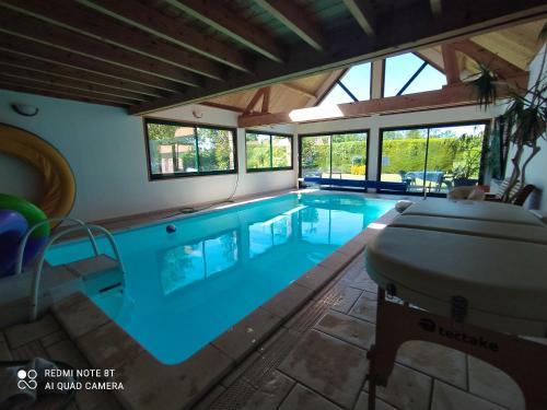 Villa de 4 chambres avec piscine privee sauna et jardin clos a Saint Augustin : Villas proche d'Audincthun