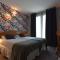 Hotels Le Castel Fleuri : photos des chambres