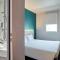 Hotels hotelF1 Les Ulis Courtaboeuf : photos des chambres