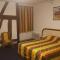 Hotels Le Cheval Rouge : photos des chambres