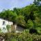 Maisons de vacances Le Pidro - A family house with private stream and woodland : photos des chambres