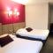 Hotels HOTEL DU COMMERCE : photos des chambres