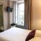 Hotels HOTEL DU COMMERCE : photos des chambres