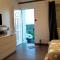 Appartements Studio avec jardin clos et wifi a Vierville sur Mer : photos des chambres