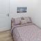 Appartements Le cosy fertois-Wifi-Netflix-trivelys com : photos des chambres