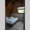 Maisons de vacances Maison dans corps de Ferme 6 couchages avec Piscine : photos des chambres