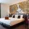 Hotels Hotel Roi Soleil Prestige Plaisir : photos des chambres