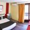 Hotels BRIT HOTEL DU LACA - Capvern : photos des chambres