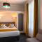 Hotels The Originals Boutique, Hotel Les Nations, Vichy (Inter-Hotel) : photos des chambres