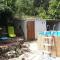 Maisons de vacances Cocon en pleine nature avec piscine privative : photos des chambres