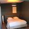 Maisons de vacances Gite avec bain nordique dans la campagne brayonne pour 2 personnes : photos des chambres