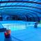 Maisons de vacances Bungalow de 2 chambres avec piscine partagee et jardin amenage a Litteau : photos des chambres