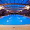 Maisons de vacances Bungalow de 2 chambres avec piscine partagee et jardin amenage a Litteau : photos des chambres