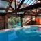 Maisons de vacances Maison avec piscine et sauna a Vire : photos des chambres