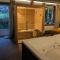 Appartements La Suite - Spa & Sauna : photos des chambres