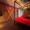 Appartements Les 50 nuances de rouge LOVEROOM : photos des chambres