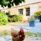 Maisons de vacances Maison de 3 chambres avec piscine privee jardin amenage et wifi a Negrondes : photos des chambres