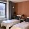 Hotels Fleurs de lin : photos des chambres