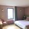 Hotels Fleurs de lin : photos des chambres