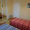 Maisons de vacances Gite Conques-en-Rouergue, 3 pieces, 4 personnes - FR-1-601-378 : photos des chambres