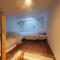 Appartements Petite maison mitoyenne avec terrasse : photos des chambres