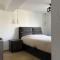 Appartements Cosala appartement avec sauna et jacuzzi privatifs : photos des chambres