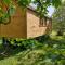 Tentes de luxe Magnifique et chaleureuse roulotte en bois : photos des chambres