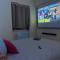 Appartements L'appart & Macaron Video projecteur & Netflix : photos des chambres