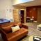Appartements La suite, avec jacuzzi & sauna : photos des chambres
