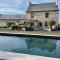 Maisons de vacances Maison cosy avec Spa privatif et piscine chauffee pres Vitre et Rennes : photos des chambres