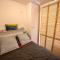 Appartements Residence du Centre Joli studio renove avec coin nuit terrasse et parking prive : photos des chambres