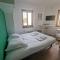 Appartements Green Studio Confort & Thermes : photos des chambres