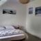 Maisons de vacances Entre terre & mer - Saint Andre des Eaux - La Baule avec piscine : photos des chambres