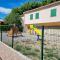 Maisons de vacances Maison avec exterieur dans un village provencal : photos des chambres