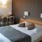 Hotels Logis Le Cheval Rouge : photos des chambres