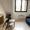 Appartements Cosy Studio with City View : photos des chambres