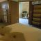 Maisons de vacances Gite haut de gamme avec jacuzzi privatif : photos des chambres