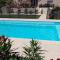 Villas Villa avec plage a pied et grande piscine : photos des chambres