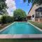 Villas Grande maison Brocante avec piscine proche centre : photos des chambres