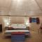 Tentes de luxe Cabane tout confort au calme : photos des chambres