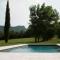 Villas Magnifique maison en pierre avec piscine : photos des chambres