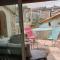 Maisons de vacances Maison avec Jacuzzi et terrasse sur les toits : photos des chambres